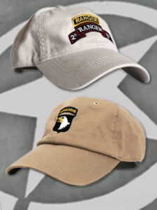 Military caps with embroidered symbols.